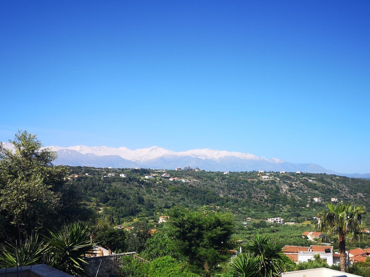 Green Apokoronas countryside and White Mountains viewed from Villa Koumos