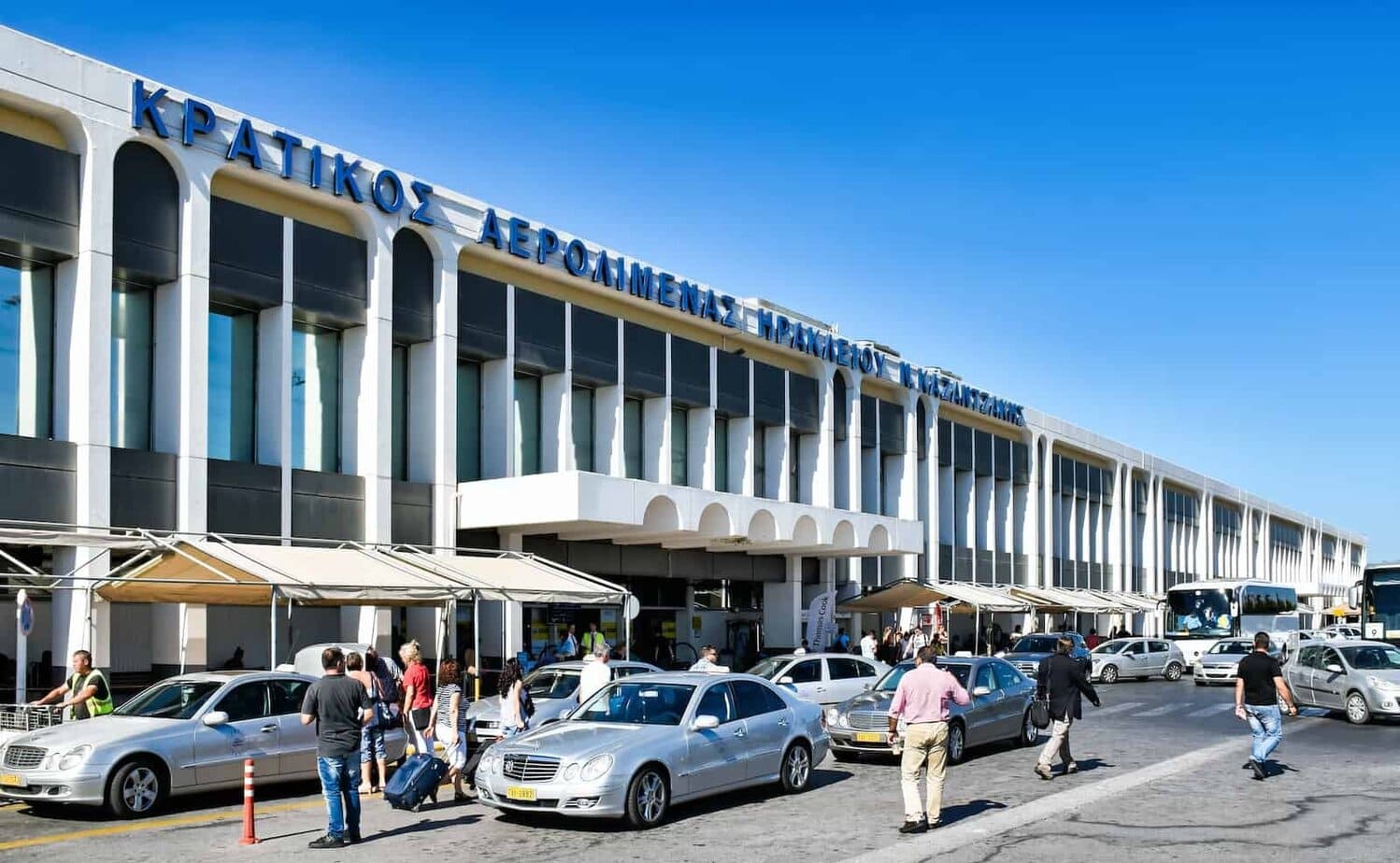 Picture of Heraklion Airport with taxis and cars waiting outside the terminal building