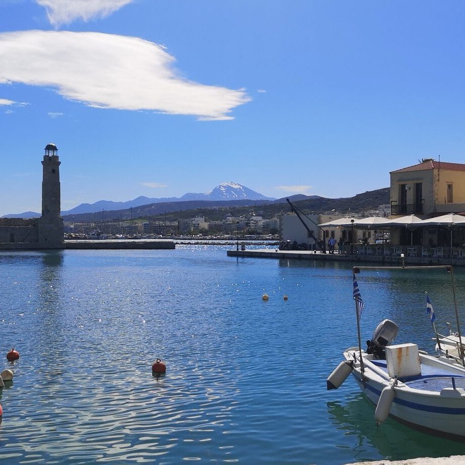 The harbour at Rethymno with tavernas and mountain views